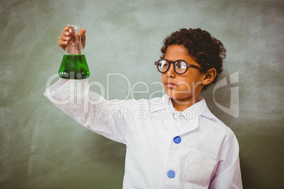 Bboy holding conical flask in classroom