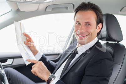 Businessman reading a map