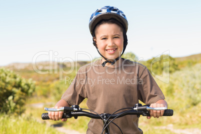 Little boy on a bike ride