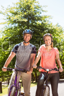 Happy couple on a bike ride