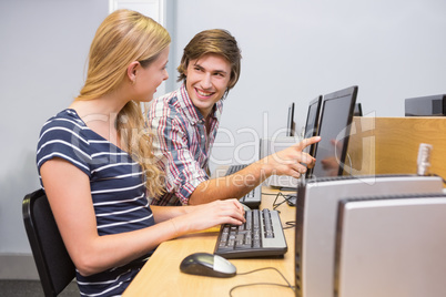 Students working together on computer