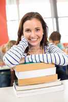 Smiling female student in classroom