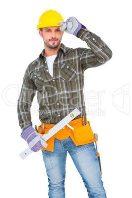 Repairman holding spirit level