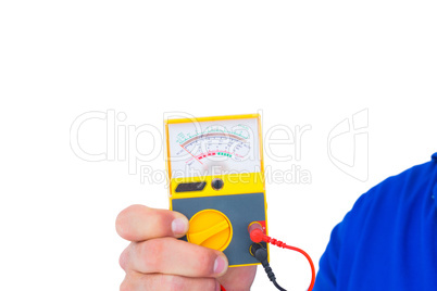 Electrician holding voltage tester