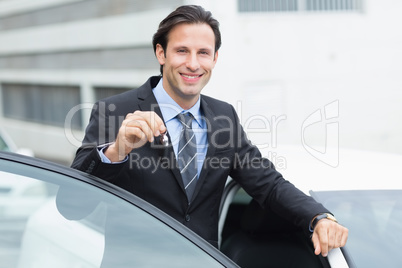 Businessman holding key