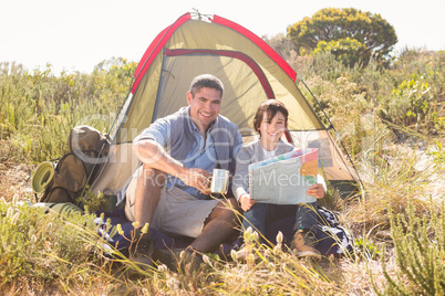 Father and son in their tent