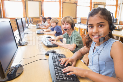 Cute pupils in computer class