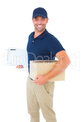 Smiling delivery man with package and clipboard
