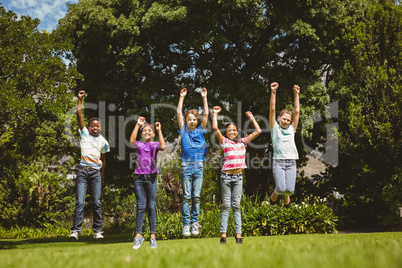 Children jumping at park