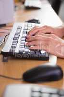 Student using computer in classroom