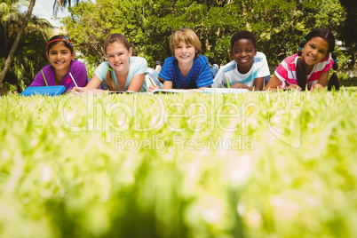 Children doing homework at park