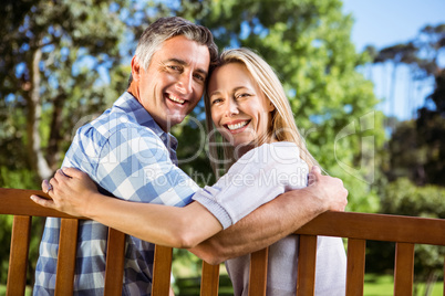 Couple relaxing in the park on bench