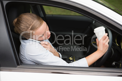 Young businesswoman having a coffee