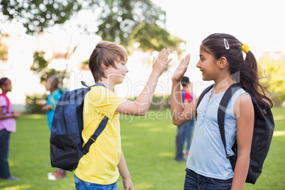 Happy friends playing in the park