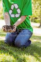 Environmental activist about to plant tree