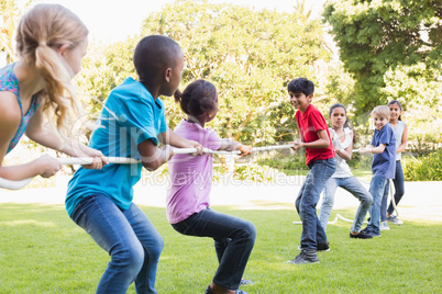 Happy friends playing in the park