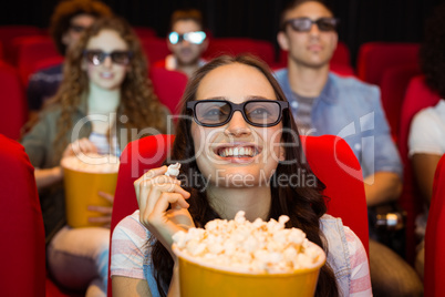 Young friends watching a 3d film