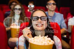 Young friends watching a 3d film