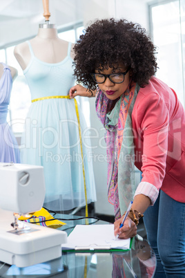 Female fashion designer at work