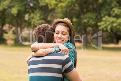 Young couple hugging in the park