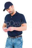 Delivery man using mobile phone