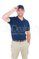 Portrait of happy delivery man wearing cap