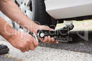 Man fixing tire