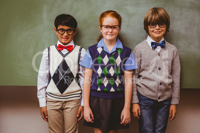 Smiling little school kids in classroom