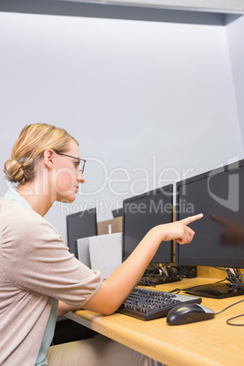 Student working on computer in classroom