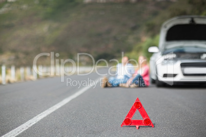 Couple after a car breakdown