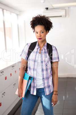 Casual young woman with folder