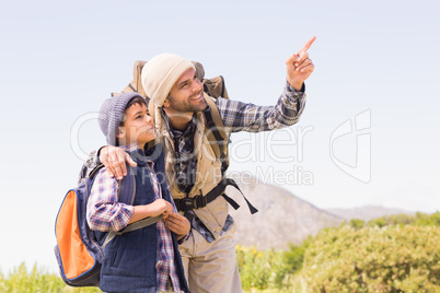 Father and son hiking in the mountains