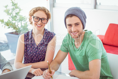 Fashion students smiling at camera