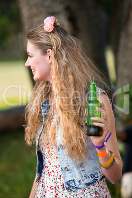 Blonde hipster having a beer