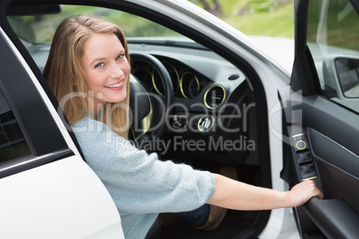 Young woman in the drivers seat