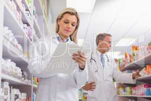 Young trainee writing on a prescription pad