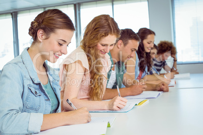 Fashion students taking notes in class