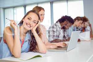 Fashion student smiling at camera