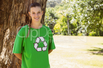 Environmental activist smiling at camera in the park