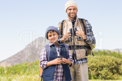 Father and son hiking in the mountains