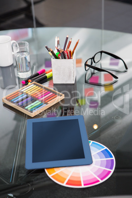 Colour samples and digitizer on desk