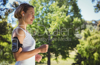 Fit woman jogging in the park