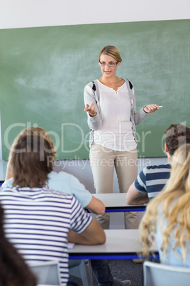 Teacher teaching students in class