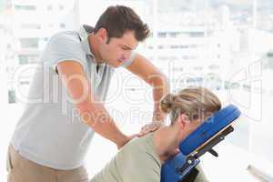 Woman having back massage