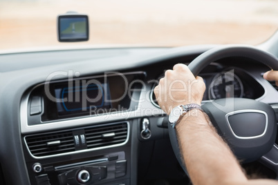 Man driving with satellite navigation system