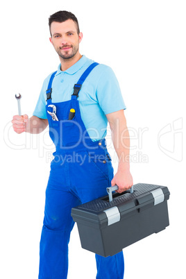 Repairman with toolbox and spanner