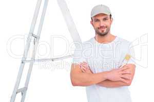 handyman with paintbrush and ladder