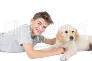 Boy with dog over white background