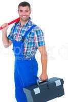 Happy repairman with toolbox and monkey wrench