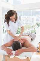 Man receiving back massage